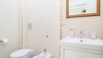 Shower, free toiletries, hair dryer, bathrobes