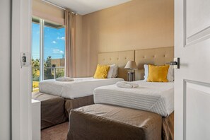 4 dormitorios, tabla de planchar con plancha, cuna de viaje y wifi