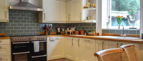 Dishwasher, high chair, cookware/dishes/utensils