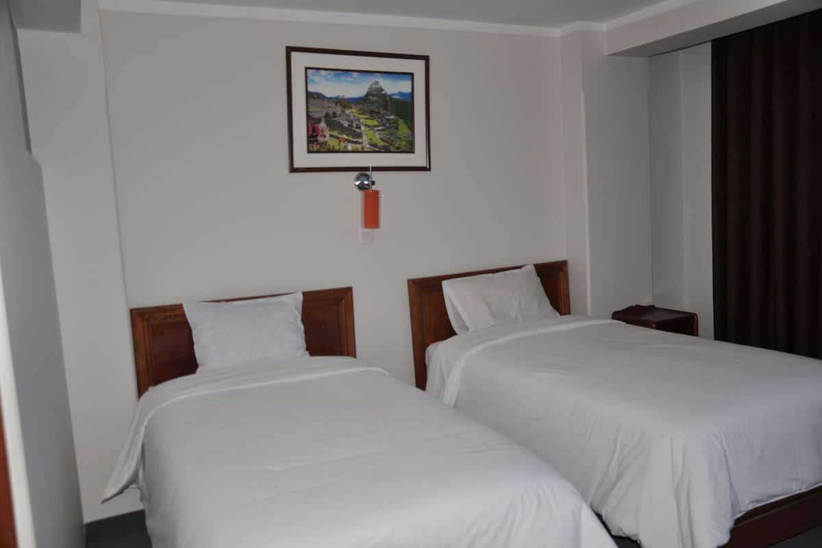 Desk, free WiFi, bed sheets
