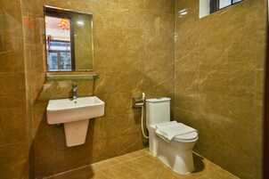 Shower, hair dryer, slippers, soap