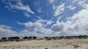 On the beach, white sand
