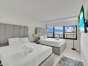 2 slaapkamers, een strijkplank/strijkijzer, reisbedje, gratis wifi