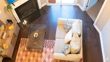 Smart TV, fireplace, books