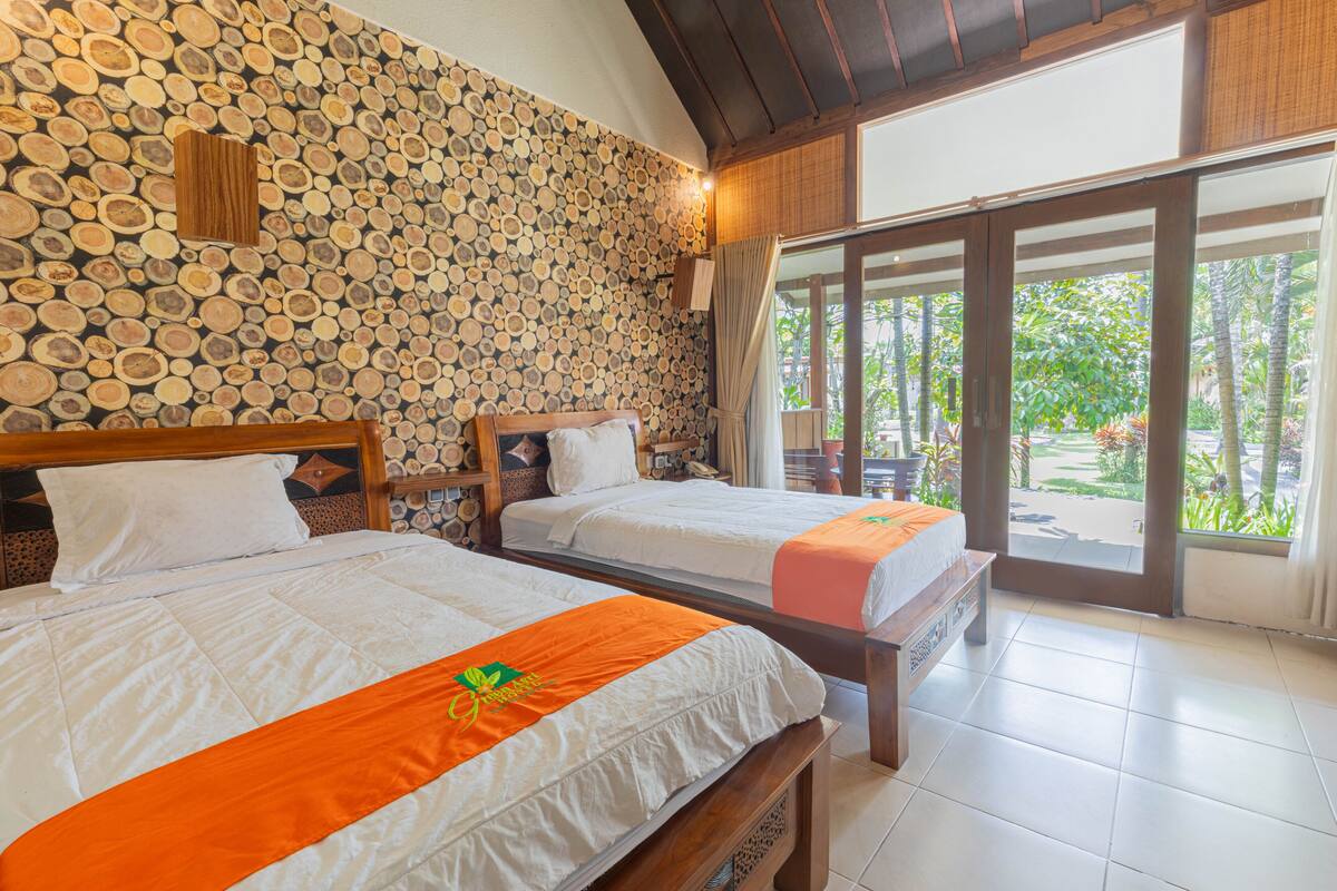 Habitación Deluxe con 2 camas individuales | Wifi gratis y ropa de cama 