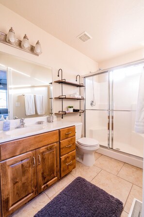 Shower, hair dryer, towels, soap