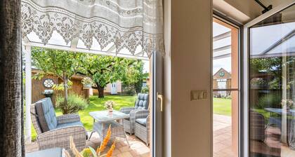 Ferienhaus 'Ferienhaus 75 Qm, 1 Schlafzimmer' mit privater Terrasse, Gemeinschaftsgarten und WLAN