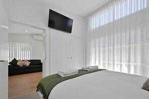 1 slaapkamer, een strijkplank/strijkijzer, wifi, beddengoed