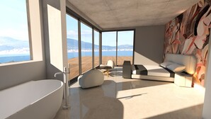 Une salle de bain moderne dotée d’une grande baignoire, d’un lavabo contemporain et d’un design minimaliste.