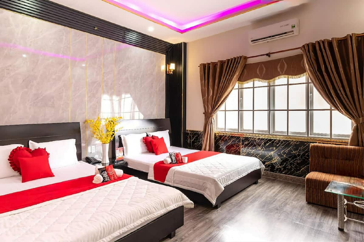 Phòng dành cho gia đình | 1 phòng ngủ, minibar, bàn, màn/rèm cản sáng