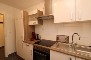 Refrigerador, horno, placa de cocina, lavavajillas