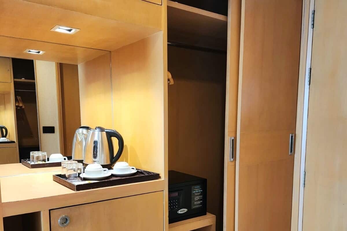 Desk, laptop workspace, blackout drapes, iron/ironing board