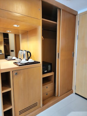 Desk, laptop workspace, blackout drapes, iron/ironing board