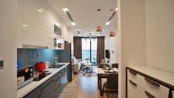 Deluxe Apartment, 1 Bedroom | Private kitchen | Fridge, microwave, stovetop, rice cooker