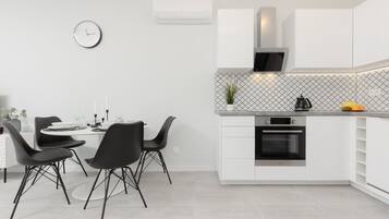Apartment, 1 Bedroom, Balcony | Private kitchen | Oven, dishwasher, coffee/tea maker, electric kettle