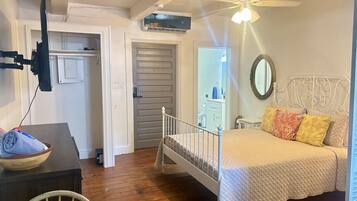 1 bedroom, desk, iron/ironing board, travel crib