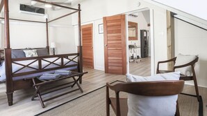 1 bedroom, desk, iron/ironing board, travel crib