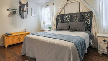 1 bedroom, desk, iron/ironing board, travel cot