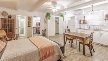 1 bedroom, desk, iron/ironing board, travel crib