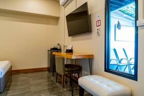 Chambre Quadruple Deluxe | Coin séjour