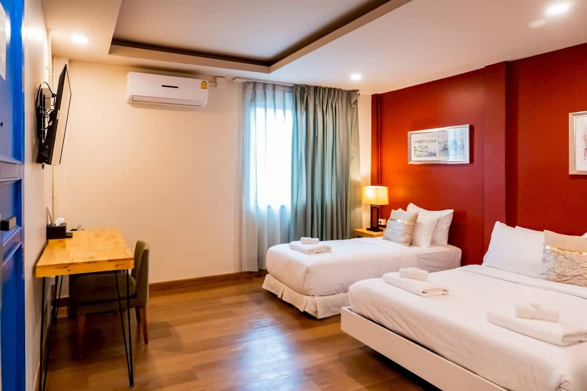 Minibar, desk, blackout curtains, iron/ironing board