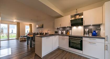 Schönes Ferienhaus mit Sauna, Kamin, GroĂer SĂŒd-terrasse und Balkon zum Meer