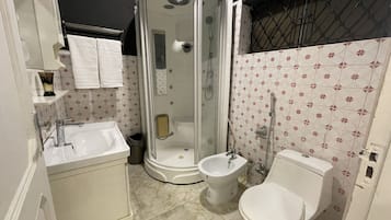 Hair dryer, towels, soap, toilet paper