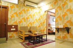 Signature Suite, 1 Double Bed | Living area | 32-inch flat-screen TV with cable channels, TV - Mount Amara Hotel & Spa (Jalpaiguri)