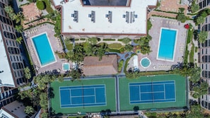 A heated pool - Waterfront 2BR/2BA condo with pool, marina access, WiFi, and full kitchen. (Marco Island)