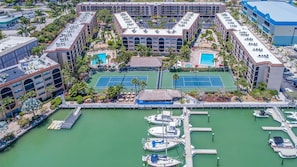 Exterior - Waterfront 2BR/2BA condo with pool, marina access, WiFi, and full kitchen. (Marco Island)