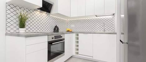 Réfrigérateur, four, plaque de cuisson, lave-vaisselle