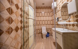 Quarto superluxo | Banheiro | Chinelos, toalhas de banho