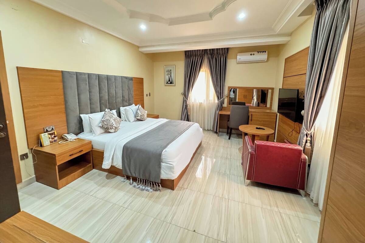 Desk, laptop workspace, blackout drapes, soundproofing