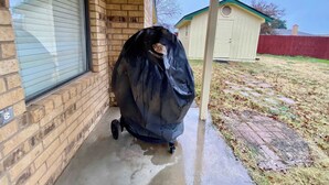 A covered porch area with a brick wall and a window. - Blue Jay's Magnolia - 3BR 2BA - Family Friendly (Lubbock)