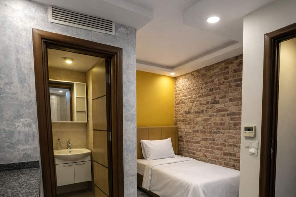 Economy-Einzelzimmer | 1 Schlafzimmer, Verdunkelungsvorhänge, schallisolierte Zimmer