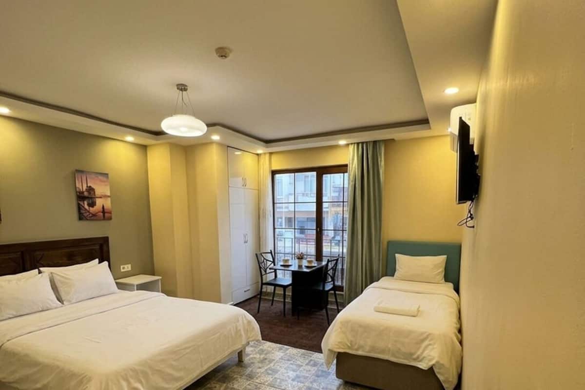 Deluxe-Zimmer | 1 Schlafzimmer, Verdunkelungsvorhänge, schallisolierte Zimmer