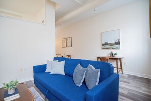 Deluxe Apartment, 2 Bedrooms | Living area | 42-inch Smart TV with digital channels, Netflix, Hulu - CozySuites The Block Skybridge Access 1 (Indianapolis)