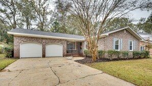 A two-story house with a brick facade, a garage, and a driveway. - North Charleston Escape ~ 15 Mi to Dtwn Charleston (North Charleston)