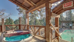 A wooden deck with a hot tub and a pool, surrounded by trees. A 'No Diving Allowed' sign is visible. - Ride to Sturgis! Lead Home w/ Pool Access (Lead)