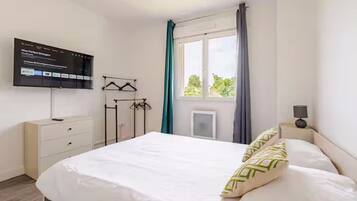 3 dormitorios, tabla de planchar con plancha, wifi y ropa de cama