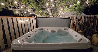 Your cozy home away from home + jacuzzy
