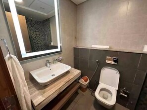 Hair dryer, towels, soap, shampoo