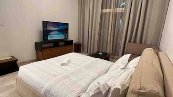 1 chambre, fer et planche Ă repasser, Wi-Fi, draps fournis