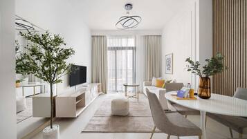 Superior Apartment | Living area | 43-inch LED TV with cable channels