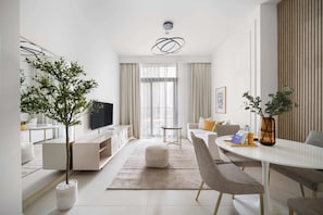 Apartamento superior | Área de estar | TV LED 43 polegadas com canais a cabo