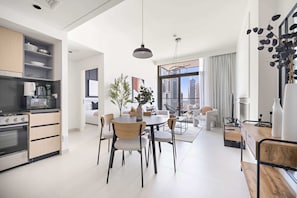 Grand Apartment | Living area | 43-inch LED TV with cable channels