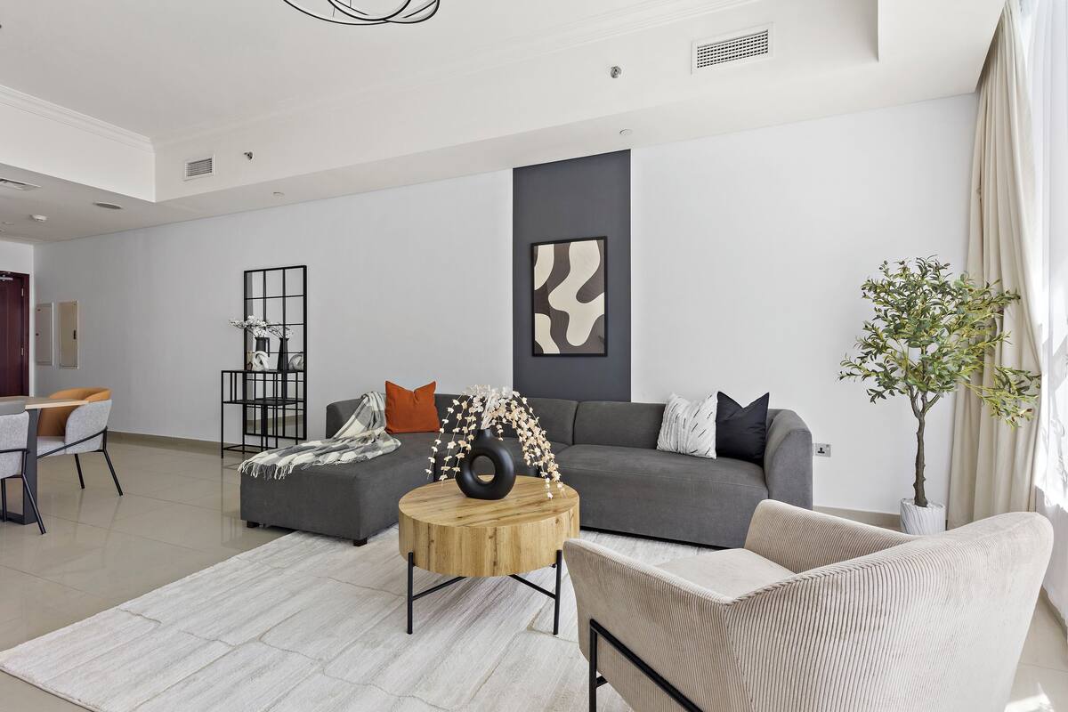 Grand Apartment | Living area | 50-inch Smart TV with digital channels