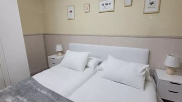 1 habitación, tabla de planchar con plancha, wifi y ropa de cama