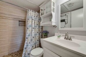 Hair dryer, towels, soap, shampoo