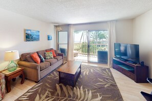 Departamento, 1 habitación (Deluxe) | Área de sala de estar | Televisión 